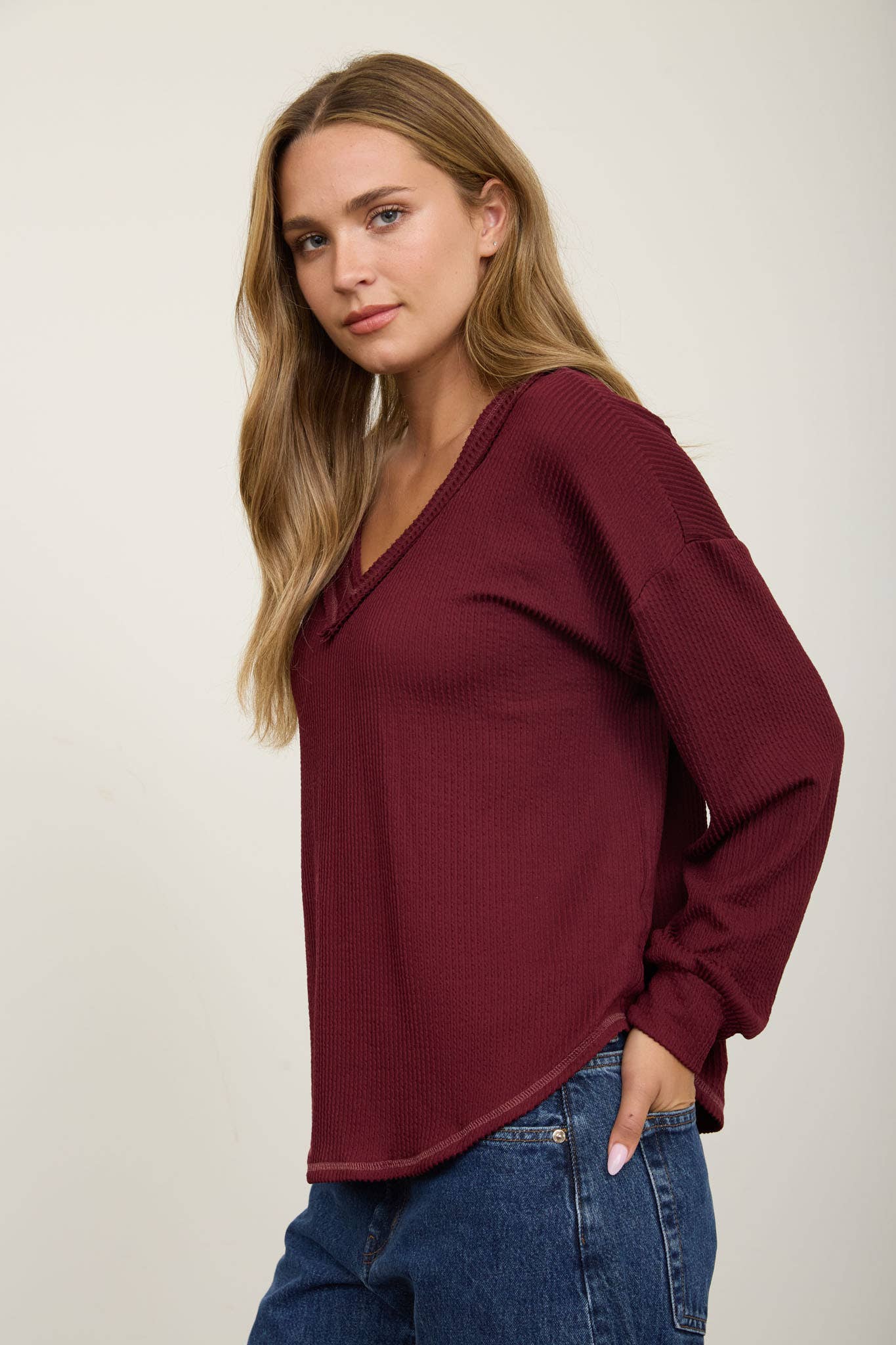 RAW EDGE V-NECK LONG SLEEVE TEXTURED KNIT TOP