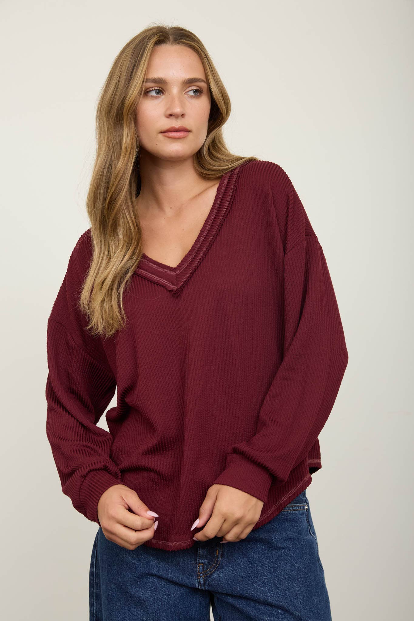 RAW EDGE V-NECK LONG SLEEVE TEXTURED KNIT TOP