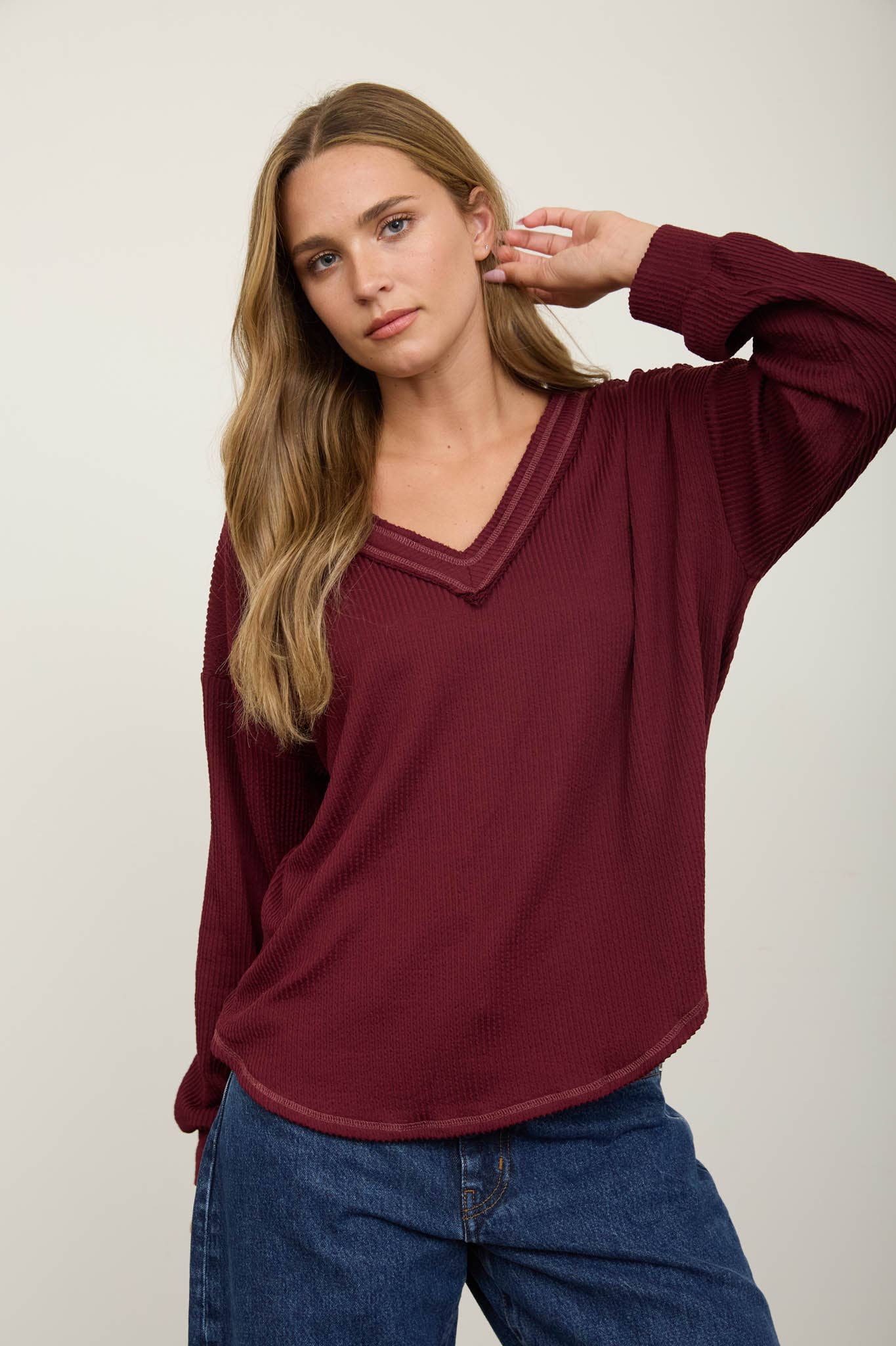 RAW EDGE V-NECK LONG SLEEVE TEXTURED KNIT TOP