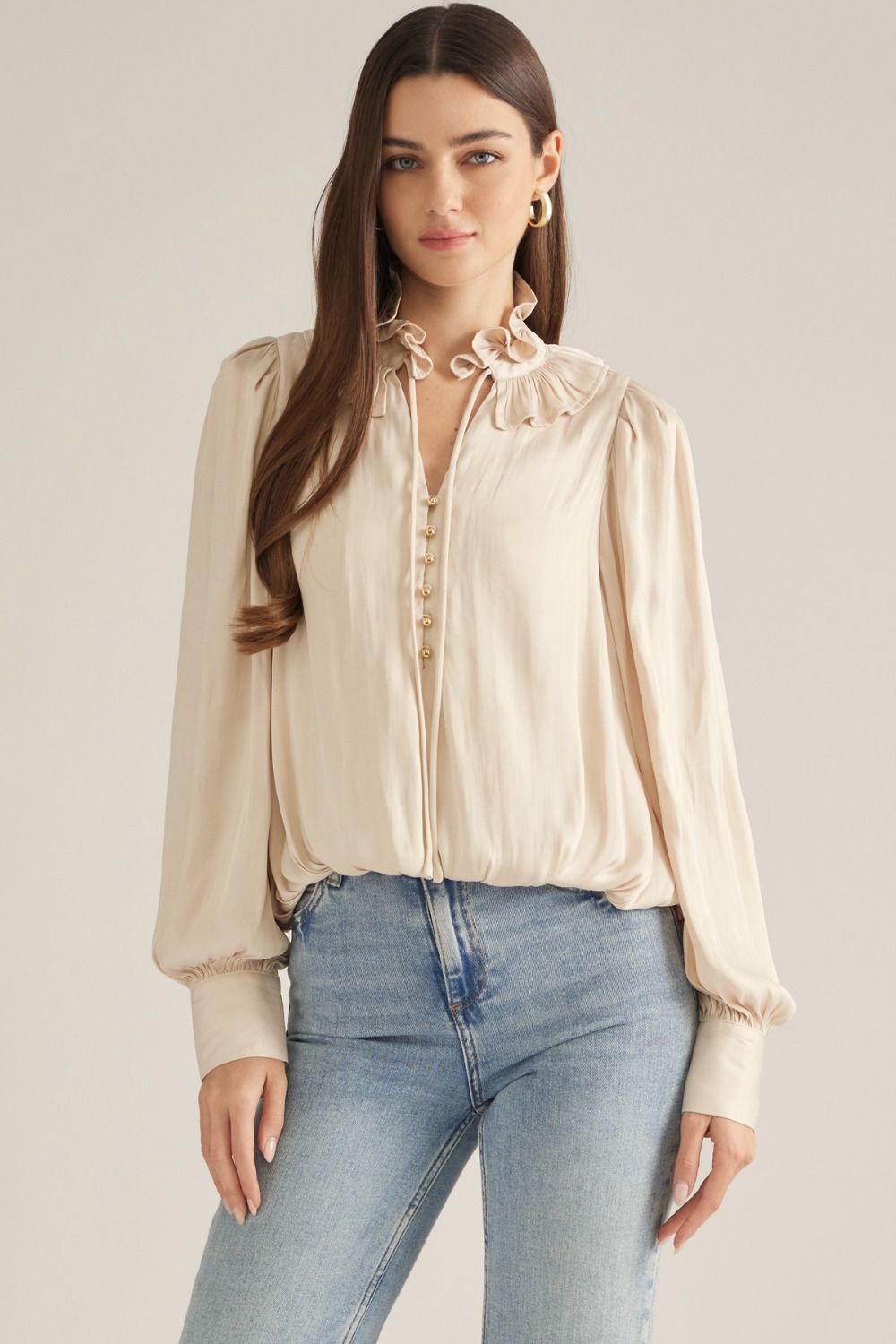 top with a ruffled neckline